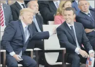  ??  ?? French President Emmanuel Macron, right, and US President Donald Trump at the traditiona­l Bastille Day military parade.