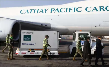  ?? — Reuters ?? Crucial cargo: A container with first doses of the Sinovac Biotech Covid-19 vaccine upon their arrival at Benito Juarez Internatio­nal Airport in Mexico City.