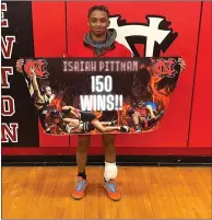  ?? ?? Red Devils wrestler Isaiah Pittman collected his 150th career win on Tuesday.