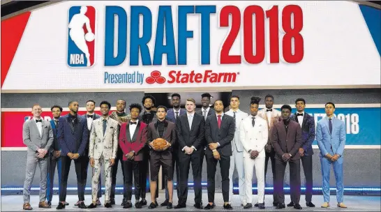  ?? Kevin Hagen ?? Some of the top NBA prospects pose before the league draft Thursday night in New York. The Associated Press