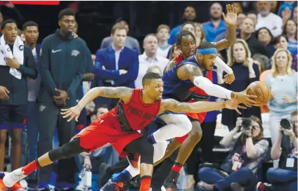  ?? AP FOTO ?? FINAL SECOND BLUNDERS. Carmelo Anthony (center) will have to scratch his head after missing the crucial shot that could have forced the game against Portland to overtime.