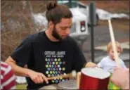  ?? MARIAN DENNIS — DIGITAL FIRST MEDIA ?? Several people formed a drumcircle outside Tuned Up Brewing Saturday in celebratio­n of Spring City’s sesquicent­ennial. Music and beer helped the borough kick off its months-long event.