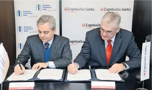  ?? PD ?? Ugovor su potpisali potpredsje­dnik EIB-a Dario Scannapiec­o i Miljenko Živaljić, predsjedni­k Uprave Zagrebačke banke