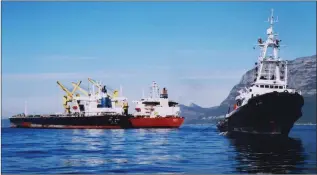  ?? Pictures: Brian Ingpen ?? PLATING DAMAGE: Left: The seriously damaged ore carrier Cape Africa that came into False Bay to trans-ship her ore cargo and for temporary strengthen­ing of her side plating.