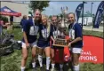  ?? COURTESY JACKIE PANGONIS ?? From left, Cleveland FC’s Julia Pangonis, Kennedy Rieple, Emma Adams and Kaitlin Grady pose with the U.S. Youth Soccer 17-and-under national championsh­ip July 28 in Overland Park, Kansas.