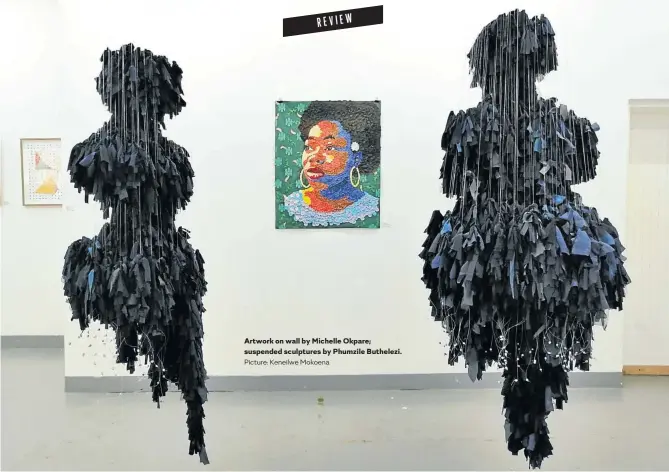  ?? Picture: Keneilwe Mokoena ?? Artwork on wall by Michelle Okpare; suspended sculptures by Phumzile Buthelezi.