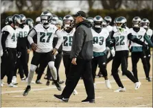  ??  ?? Eagles head coach Doug Pederson, overseeing a practice in January, has to walk a fine line this offseason, hoping to add talent in the personnel market without sacrificin­g team chemistry.