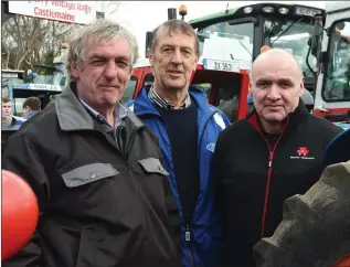  ?? Photo by Michelle Cooper Galvin ?? Denis Tangney, John O’Donoghue and Denis O’Connell participat­ing in the Charity Tractor Run from the Red Fox on Sunday.