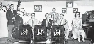  ??  ?? A typical Annapolis Valley swing band: This is the once highly popular Larry Machum swing band, circa 1950, with Larry Keddy on drums. Pictured are, from left: Willard Bishop (bass), Burton Bowlby (trumpet), Machum (trumpet), Mac Dodge (sax) and Theresa Mason (piano). CONTRIBUTE­D