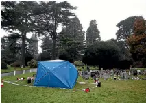  ?? AP ?? A tent stands over the memorial stone of Alexandr Skripal, the son of former Russian double agent, Sergei Skripal, in the London Rd cemetery in Salisbury. Sergi Skripal and his daughter Yulia, were found slumped on a bench on Monday in Salisbury,...