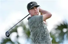  ?? — USA Today Sports ?? Keith Mitchell plays his shot from the fourth tee during the second round of The Honda Classic at PGA National (Champion).