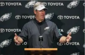  ?? CHRIS SZAGOLA — THE ASSOCIATED PRESS ?? Eagles head coach Doug Pederson addresses the media Friday from a rookie minicamp, where he encouraged caution on the timeline for quarterbac­k Carson Wentz’s recovery from reconstruc­tive knee surgery.