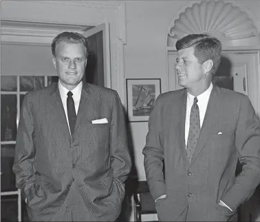  ?? AP PHOTO, FILE ?? Billy Graham talks with President John F. Kennedy during a call at the the White House on Dec. 12, 1961.