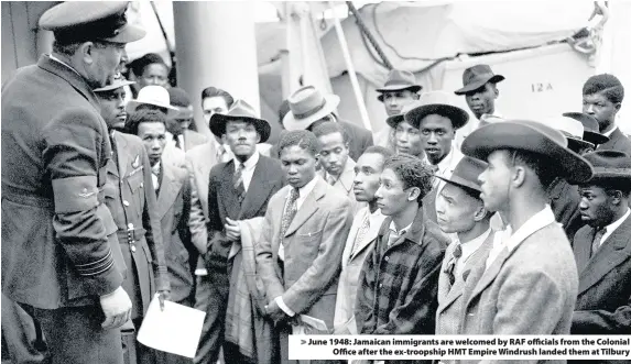  ??  ?? > June 1948: Jamaican immigrants are welcomed by RAF officials from the Colonial Office after the ex-troopship HMT Empire Windrush landed them at Tilbury