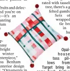  ?? Associated Press ?? Opal- house toss pillows from Target bring in some fresh, festive berry and candy hues to holiday décor.