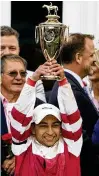  ?? JEFF ROBERSON / AP ?? Jockey Sonny Leon celebrates after winning the Kentucky Derby horse race at Churchill Downs Saturday.