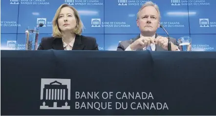  ?? ADRIAN WYLD/THE CANADIAN PRESS ?? In 2009, Canada’s key interest rate was at 1.25 per cent as the nation struggled following the economic collapse. Last week, the Bank of Canada tightened its rate to 1.25 per cent. Should we read anything into that? History shows parallels, writes...