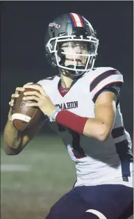  ?? Dave Stewart / Hearst Connecticu­t Media ?? Brien McMahon quarterbac­k Callum Letters gets set to throw against New Canaan on Friday night/