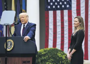  ??  ?? U.S. President Donald Trump speaks next to Judge Amy Coney Barrett at the Rose Garden of the White House, Washington, D.C., Sept. 26, 2020.