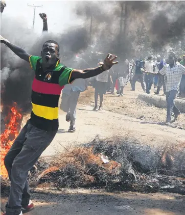  ?? Picture / AP ?? Supporters of opposition leader Raila Odinga were out in force on the streets of Kisumu.