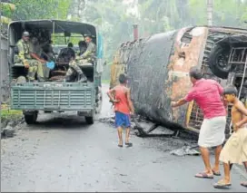  ?? HT FILE/SAMIR JANA ?? Basirhat in the North 24 Parganas district was swept by violence for several days after Muslim mobs went on a rampage, angered by a controvers­ial Facebook post by a Hindu teenager. One person was killed and several homes, shops and vehicles torched...