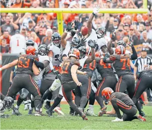  ?? RON SCHWANE THE ASSOCIATED PRESS ?? Cleveland rookie Greg Joseph’s kick just barely cleared the crossbar for a 37-yard-field goal, but it was good enough to lift the Browns to an overtime win over the Ravens.