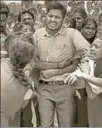  ?? COURTESY: PUTHIYA THALAIMURA­I TV ?? ■ A teacher in a Tamil Nadu school was mobbed by his students who did not want him to go