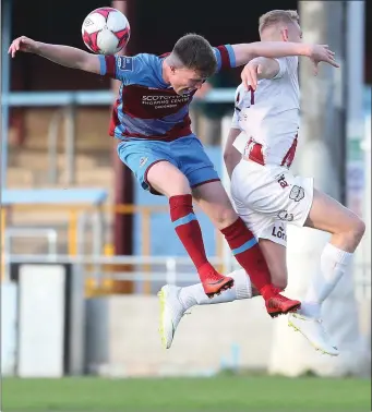  ??  ?? Drogheda’s Conor Kane had to leave the field following an injury in this clash with Eoin McCormack.