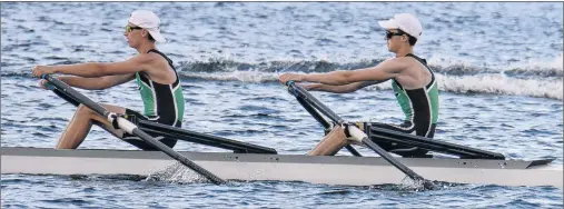  ?? JASON MALLOY/THE GUARDIAN ?? Tristan Russell MacLean, left, and Donald DeWolfe competed in the double sculls rowing competitio­n Tuesday in Kenora, Ont. More Canada Summer Games coverage on page B2.