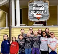  ?? Courtesy of Kiera Hovey ?? The Albany Alleycats organizati­on collected supplies for Ronald Mcdonald House. The girls were given a tour of the house and learned about the services provided by the organizati­on before traveling for a State Cup game.