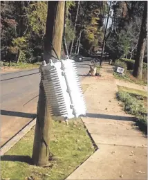  ?? CONTRIBUTE­D BY ART CHAPPLE ?? Art Chapple wants to see this unsightly device removed from a power pole in Atlanta.