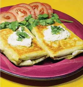  ?? Linda Gassenheim­er/Tribune News Service ?? Pan-fried chimichang­as are quick and easy to make on game day.