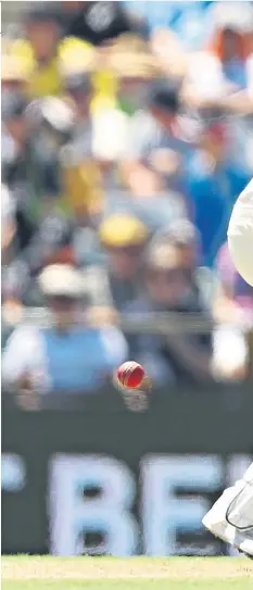  ??  ?? Heavy blow: Mark Stoneman is struck on the helmet by a ball from Josh Hazlewood that broke his grille