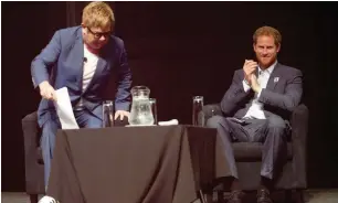  ?? PICTURE: EPA ?? AIDS FIGHTERS: British rock legend Sir Elton John and Britain’s Prince Harry at the July 2016 Internatio­nal Aids Conference at the Durban Internatio­nal Conference Centre.