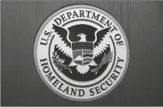  ?? ASSOCIATED PRESS ?? THE DEPARTMENT OF HOMELAND SECURITY SEAL is seen June 28, 2019, during a news conference in Washington. An official at the Department of Homeland Security says he was pressured by agency leaders to suppress details in his intelligen­ce reports that President Donald Trump might find objectiona­ble.