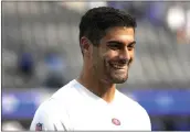  ?? KEITH BIRMINGHAM – SCNG ?? 49ers quarterbac­k Jimmy Garoppolo smiles prior to the NFC championsh­ip game against the Los Angeles Rams at SoFi Stadium in Inglewood in January.