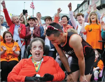  ?? Shane Finn with his couin Mary Evans after he completed his ‘24 marathons in 24 days’ challenge in July. Photo by Declan Malone ??