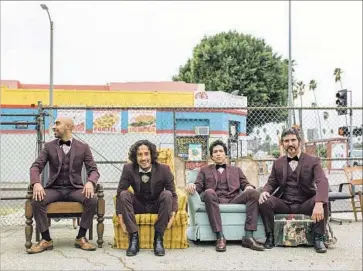  ?? Josue Rivas ?? CHICANO BATMAN members Carlos Arévalo, left, Bardo Martinez, Eduardo Arenas and Gabriel Villa have mined black music traditions for healing in malevolent times and to refocus their sound in “Freedom Is Free.”