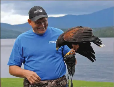  ?? PHOTO PROVIDED ?? Someone holds a bird during a past event.