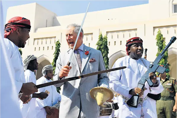  ??  ?? Charles shares a joke at the welcome ceremony; right, the Duchess sampled cupcakes; below, a welcome cake