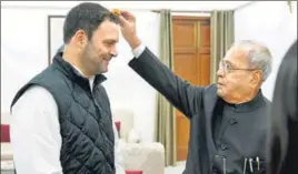  ?? PTI ?? Congress vice president Rahul Gandhi seeks blessings of former president Pranab Mukherjee before filing his nomination papers for the party chief’s post in New Delhi on Monday.