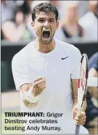  ??  ?? TRIUMPHANT: Grigor Dimitrov celebrates beating Andy Murray.