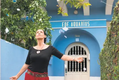  ?? Vitagraph ?? Clara (Sonia Braga) stands in front of the titular apartment building in “Aquarius.”