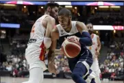  ?? MARCIO JOSE SANCHEZ — THE ASSOCIATED PRESS ?? Jayson Tatum, right, is defended by Spain’s Rudy Fernandez during the second half of an exhibition game Aug. 16 in Anaheim, Calif.