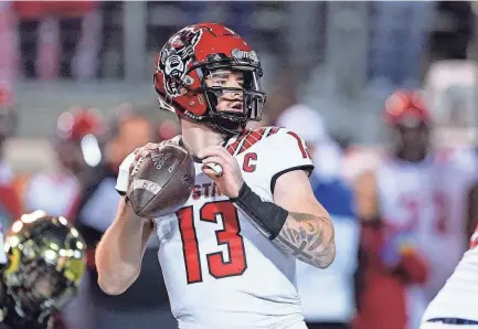  ?? CHRIS CARLSON/AP ?? Quarterbac­k Devin Leary and North Carolina State hit the road for their opener against East Carolina on Saturday.