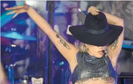  ?? Kevin Winter Getty Images ?? LADY GAGA performs selections from “Joanne” in October in Los Angeles.