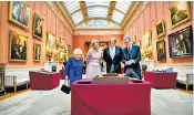  ??  ?? The Queen accompanie­s Queen Máxima and King WillemAlex­ander of the Netherland­s on a tour of the Picture Gallery in Buckingham Palace during a state visit in 2018