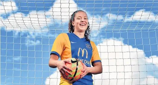  ?? PHOTO: PETER MCINTOSH ?? Goalmouth action . . . Renee Bacon in her field of expertise at Logan Park yesterday.