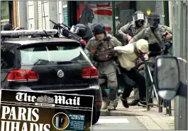  ??  ?? RAID:R Armed police drag Abdeslam from his Brussels hideout. Left: How we reported November’s atrocity