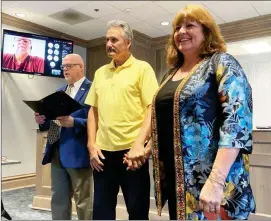  ?? PILOT PHOTO/JAMES MASTER ?? Mayor Mark Senter (left) awarded a Key to the City of Plymouth to Tom and Carolyn Blackburn for their 37 years of service to the community.